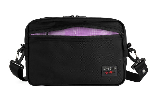 The Side Hustle in Black Ballistic with Wisteria (pale purple) 200 Halcyon interior.
